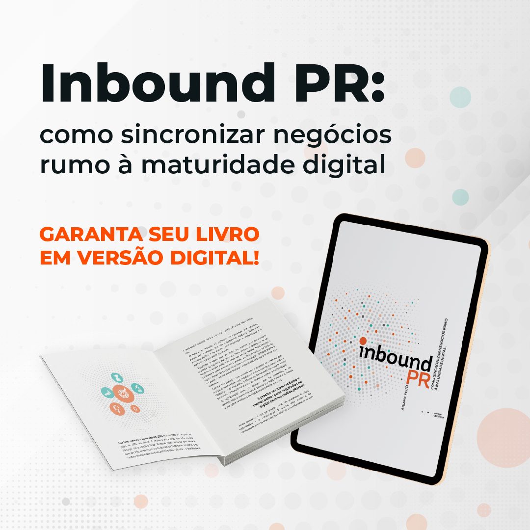 #PraCegoVer: a imagem mostra um tablet com a capa de um e-book, intitulado "Inbound PR: Como sincronizar negócios rumo à maturidade digital". Ao lado do tablet está um livro aberto, mostrando a parte interna do mesmo. Em cima de um fundo branco está o texto: "Inbound PR: Como sincronizar negócios rumo à maturidade digital. Garanta o seu livro em versão digital".